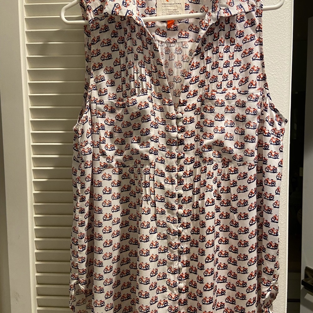 Anthropologie sleeveless “ bike” print blouse. Length 30 “ back, 26 “ front